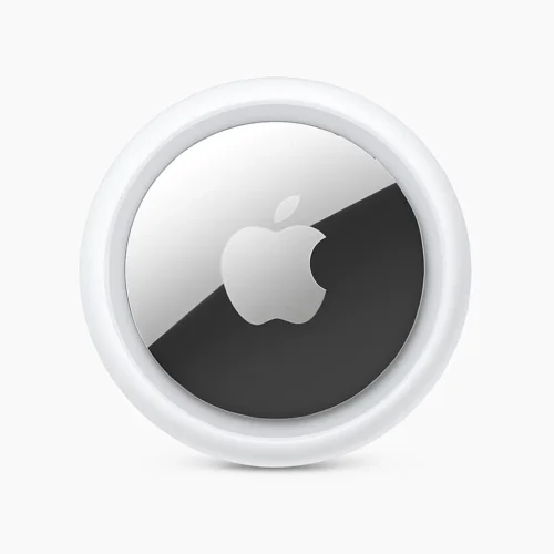 Close-up image of a single Apple AirTag showing silver Apple logo on glossy surface