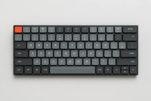 Top view of the Keychron K3 Pro mechanical Bluetooth keyboard with dark keycaps and orange accent